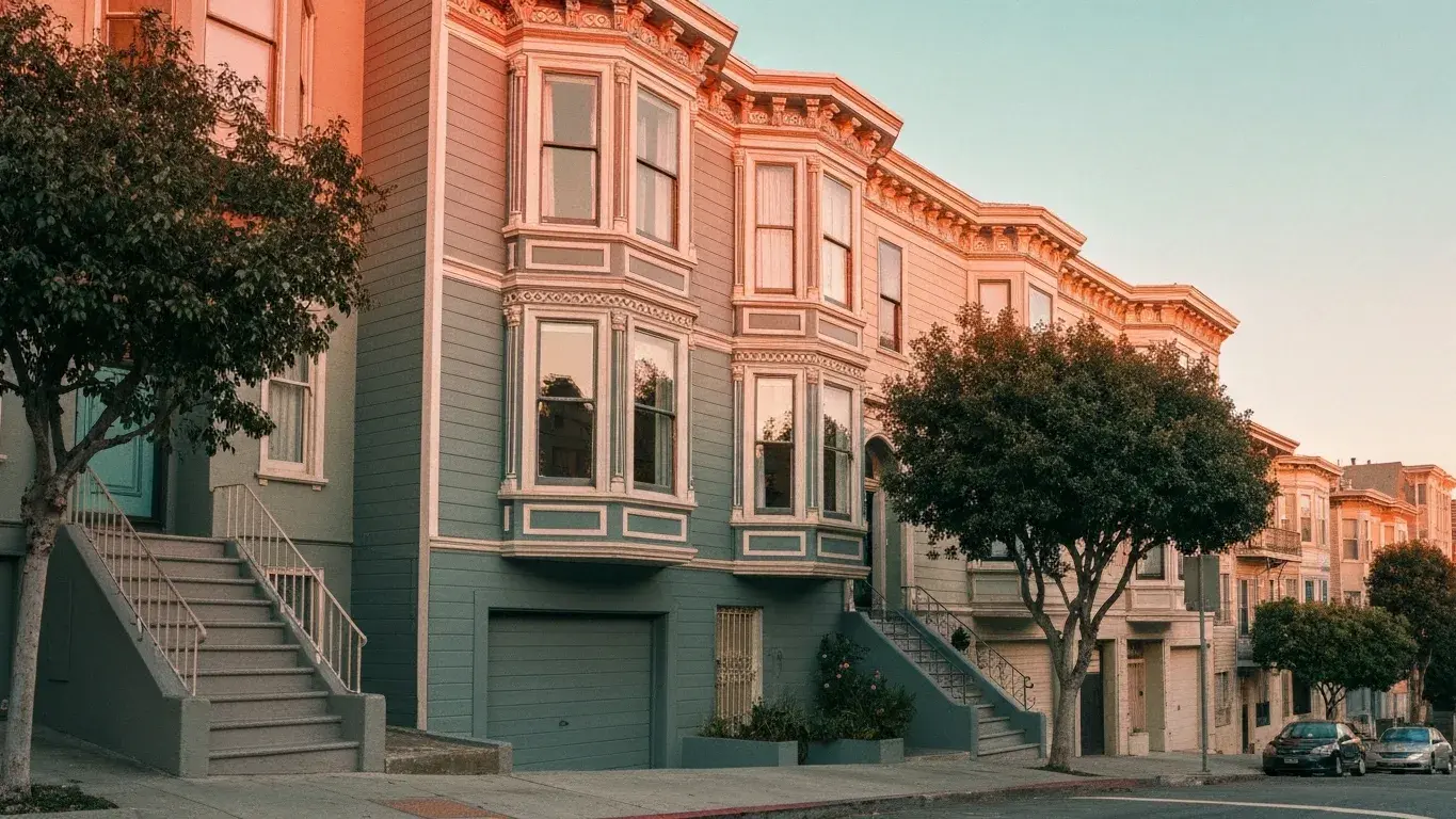 colorful Victorian 'Painted Lady' row house with ornate bay windows in San Francisco, California
